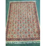 Indian rug with flower decorations 184x123cm