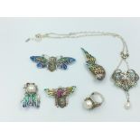 Plique a Jour brooches in the form of a parrot,dragonfly,butterfly & moth & a ring & necklace