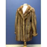 Ladies' short brown fur coat