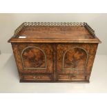 Burr walnut table cabinet, 2 doors over 2 drawers with brass fret gallery 49x27x35H cm