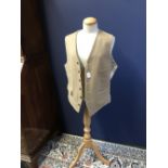 Buff coloured hunting waistcoat, with checked lining, size 42R, by clothing company Oliver Brown