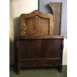 Continental single bedhead & footboard, profusely decorated & inlaid with a cherub decoration