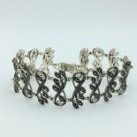 Decorative silver bracelet set with marcasites