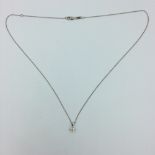 Diamond pendant necklace, single brilliant cut diamond in a 3 claw gold setting on a white gold