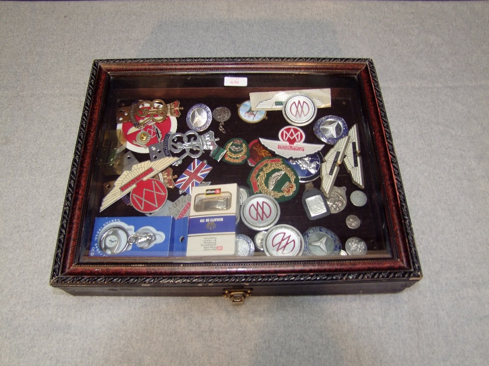 Table top display case containing Aston Martin & Mercedes Benz lapel badges, grille & bodywork - Image 2 of 2