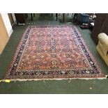 Terracotta wood rug with all over stylized pattern