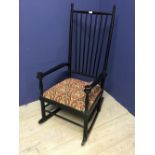 High ladder back rocking chair in black with upholstered seat