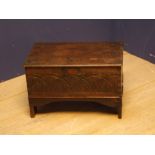 Oak coal scuttle with carved front panel