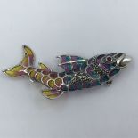 Silver brooch plique à jour in the form of a fish with a pearl in its mouth