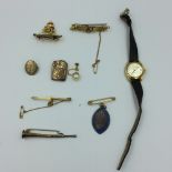 Collection of 9ct & unmarked yellow metal items to include an enamel artillery brooch, Victorian