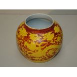 Red vase decorated with yellow dragons & floral motif 12cm
