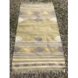Rug, modern coarse ground rug in yellow and neutral stripes 183x112cm