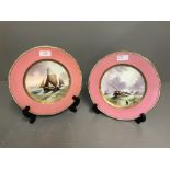 Pair of continental porcelain plates depicting 'Dutch Boats off the Doggerbank' D8397 'Cod Fishing'