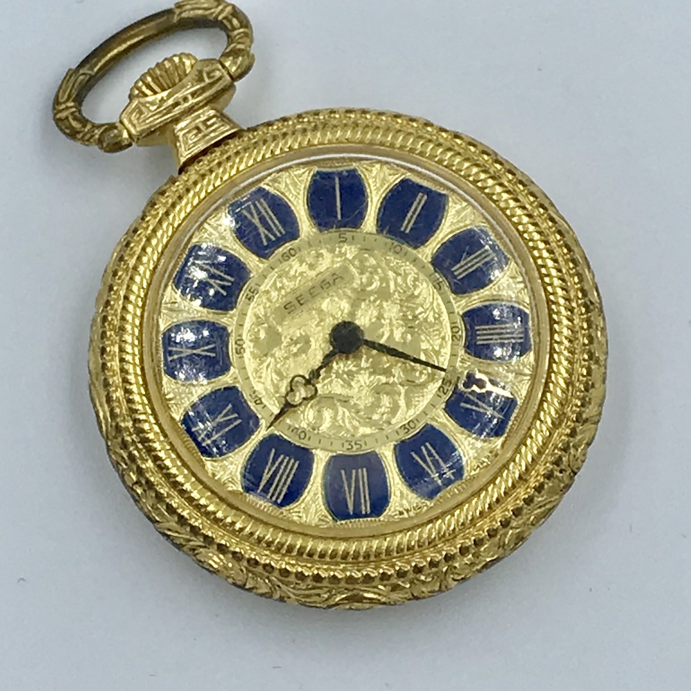 Gilt ladies' fob watch with chased dial & enamel numbers, made by Seega