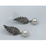 Pair silver drop earrings in the form of wings set with marcasites
