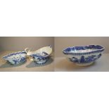 Chinese blue & white sauceboat decorated with figures by a Pagoda (chips to base), another with