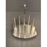 Christopher Dresser, designed as a white metal toast rack