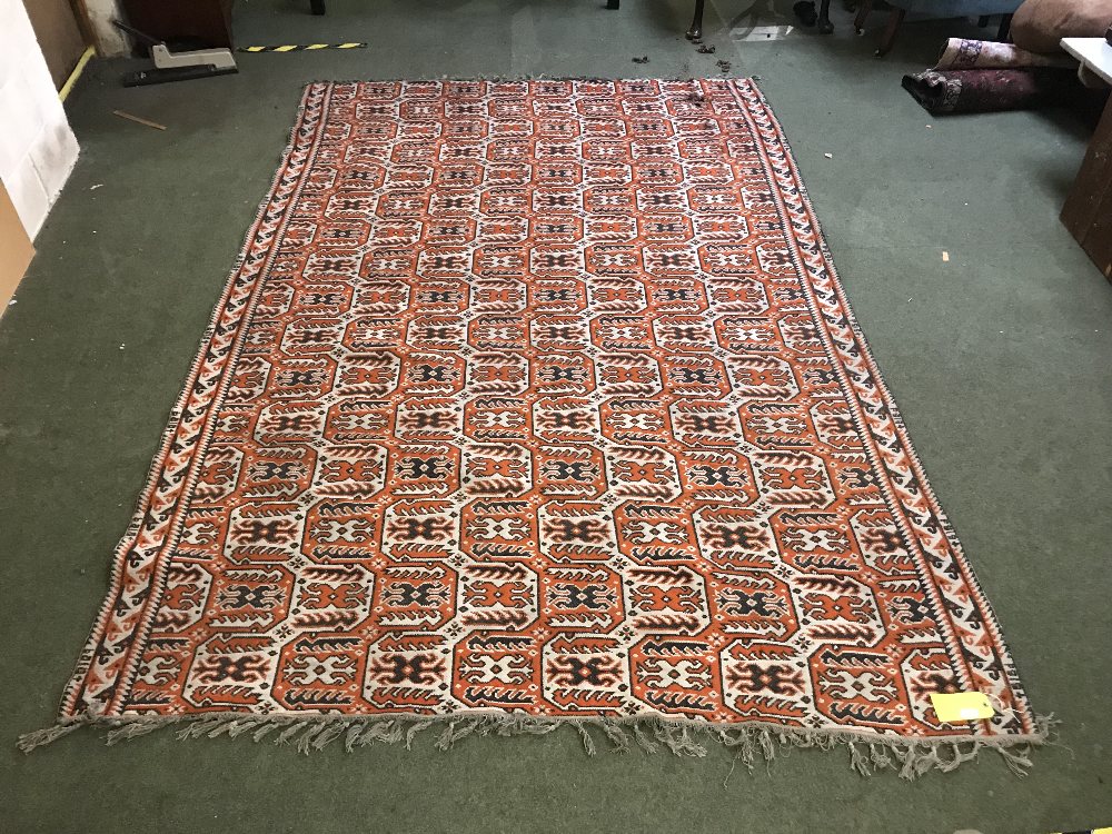 Large rug in oranges & blacks 325x210cm