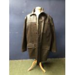 Brown leather shooting coat by clothing company Over and Under, as new