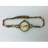 9ct Gold Tudor ladies' cocktail watch on an unmarked yellow metal strap 4.8g