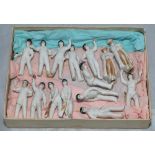 Ceramic cricket figures. A collection of fifteen Worcester China bisque cricket figures made as cake