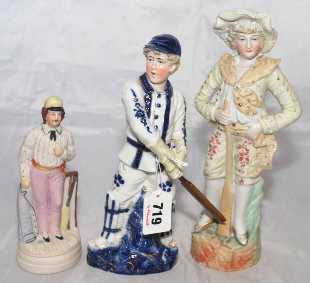 Continental cricket figures. Continental coloured porcelain figure of a boy cricketer holding a