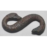 Cricket belt buckle. A Victorian metal snake belt buckle with snake heads to each end and '