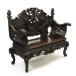 Japanese Export Hardwood Bench with Richly Carved Bamboo, Iris, Water Lily and Peony Motif and Owl