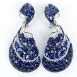 Approx. 40.0 Carat Pear Shape, Oval and Round Cut Sapphire and 18 Karat White Gold Earrings accented
