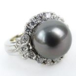 South Sea Black Pearl, Diamond and 18 Karat White Gold Ring. Pearl measures 10.5mm. Very good