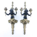 Pair of 19/20th Century Louis XVI Style Gilt Bronze Putti Figural Wall Sconces. Unsigned. Rubbing to