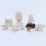 Collection of Nine (9) Carved Ivory Animals. Includes elephants, bird, horse, foo lion. Unsigned.