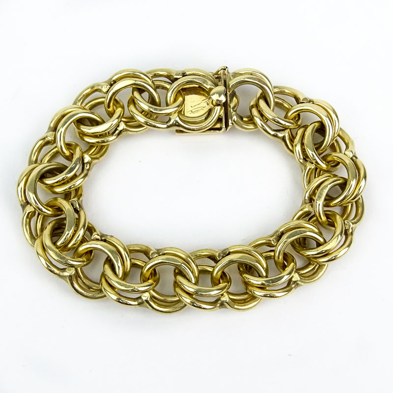 Vintage Heavy 14 Karat Yellow Gold Charm Bracelet. Stamped 14K. Good vintage condition. Measures