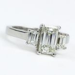 Approx. 2.35 Carat TW Emerald Cut Diamond and Platinum Engagement Ring. Set in the center with