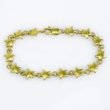 Circa 1980s Tiffany & Co 18 Karat Yellow Gold Stars Bracelet with Box. Signed, stamped 750. Good