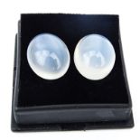 Two (2) Gem Quality Oval Cabochon Moonstones, Approx. 20.80 Carats TW. Very strong cat's eye effect,