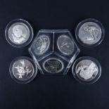 Collection of Seven (7) Sterling Silver Medals in Plastic Display. Four Franklin Mint Roberts