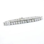 Contemporary Approx. 17.04 Carat Princess Cut Diamond and Platinum Tennis Bracelet. Diamonds E-F