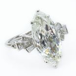 Approx. 3.57 Carat Antique Marquise Cut Diamond and Platinum Engagement Ring. Diamond I-J color, SI1