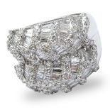 Approx. 4.0 Carat Baguette and Round Brilliant Cut Diamond and 18 Karat White Gold Dinner Ring.