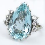 Vintage Pear Shape Aquamarine, Round Brilliant Cut Diamond and 14 Karat White Gold Ring.