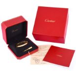 Circa 2014 Cartier 18 Karat Yellow Gold Love Bracelet with Boxes, Papers and Screwdriver. Signed, s