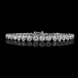 Approx. 14.0 Carat Thirty Seven (37) Graduated Round Brilliant Cut Diamond and Platinum Line Bracel