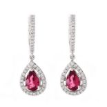 Pear Shape Rubelite Tourmaline, Diamond and 14 Karat White Gold Pendant Earrings. Unsigned. Measure