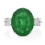 AGL Certified 7.34 Carat Oval Cut Brazilian Emerald, .80 Carat Diamond and 14 Karat White Gold Ring