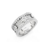 1.42 Carat Round Brilliant Cut Diamond and 18 Karat White Gold Ring. Small gears allow outer rims o