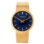 Man's Vintage Patek Philippe 18 Karat Yellow Gold Automatic Movement Bracelet Watch with Blue Dial.