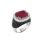 Approx. 5.11 Carat Oval Cut Ruby, 3.50 Carat Micro Pave Set Black Diamond, .61 Carat Round Brillian