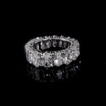 Approx. 8.0 Carat Oval Cut Diamond and 18 Karat White Eternity Band. Diamonds H-I color, VS1-SI1 cl