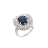 Approx. 4.0 Carat Oval Cut Sapphire, 3.25 Carat Pave Set Round Brilliant Cut Diamond and 18 karat W